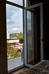 Balkón nebo terasa v ubytování Happy Stay Hotel