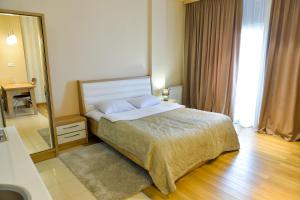 Postel nebo postele na pokoji v ubytování Happy Stay Hotel