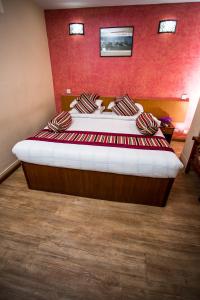 Letto o letti in una camera di Hotel Crown Plaza
