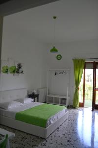 Postel nebo postele na pokoji v ubytování Sorrento Experience