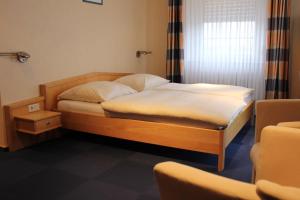 Voodi või voodid majutusasutuse Hotel Reiff toas