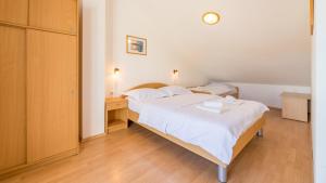 Ein Bett oder Betten in einem Zimmer der Unterkunft Damir & Gordana