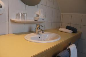 Vannituba majutusasutuses Hotel Reiff