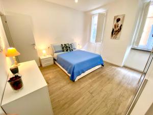 Posteľ alebo postele v izbe v ubytovaní APARTMENT VITERBO CENTRO CORSO