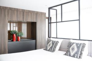 Voodi või voodid majutusasutuse Hotel Nelson toas