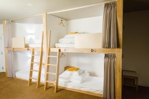 WPÜ HOTEL HAKONE客房内的一张或多张床位
