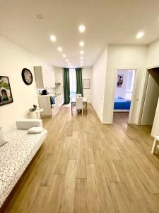 Posteľ alebo postele v izbe v ubytovaní APARTMENT VITERBO CENTRO CORSO