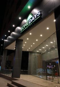 a sign on the side of a building at SOMEDAYS Serviced Apartments - Standard in Al Hofuf