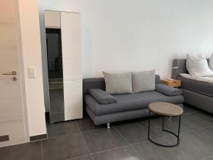 Ein Sitzbereich in der Unterkunft H&E Apartments Barntrup