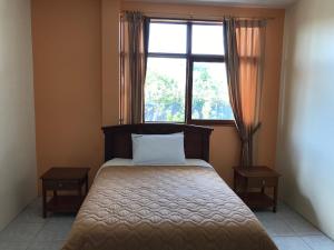 Postel nebo postele na pokoji v ubytování Hosteria Shell
