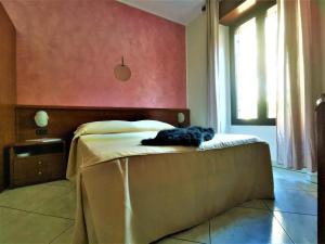 Postel nebo postele na pokoji v ubytování Hotel Venini