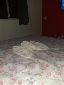 Ein Bett oder Betten in einem Zimmer der Unterkunft Lar Jampa - Bancarios