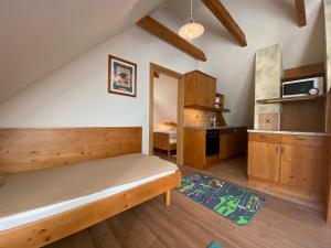 Cama o camas de una habitación en Kürbishof Gartner