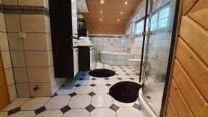 Kúpeľňa v ubytovaní Chalet Landhaus Einsiedler + 15 fotografií