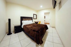 Voodi või voodid majutusasutuse Coaranda Hotel Boutique toas