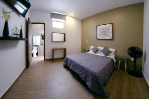 Voodi või voodid majutusasutuse Coaranda Hotel Boutique toas