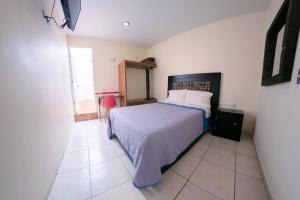 Voodi või voodid majutusasutuse Coaranda Hotel Boutique toas