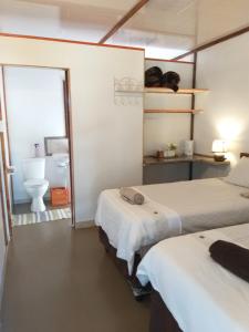 Una cama o camas en una habitación de Protea B&B
