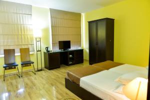 Postel nebo postele na pokoji v ubytování Imereti Health Resort