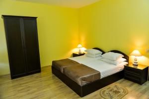 Postel nebo postele na pokoji v ubytování Imereti Health Resort