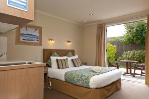 Ένα ή περισσότερα κρεβάτια σε δωμάτιο στο Beechtree Motel