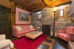 A seating area at Hotel Rural Casa Xusto
