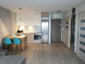 Kuchyň nebo kuchyňský kout v ubytování Apartament Baltica z ogródkiem