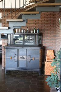 a metal cabinet in a room with a staircase at Villa-Fuldablick in Morschen