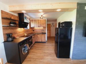 Kuchyň nebo kuchyňský kout v ubytování Honey apartments