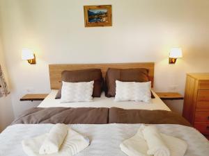 Postel nebo postele na pokoji v ubytování Honey apartments