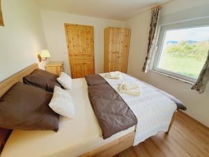 Postel nebo postele na pokoji v ubytování Honey apartments