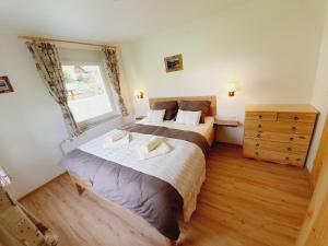 Postel nebo postele na pokoji v ubytování Honey apartments