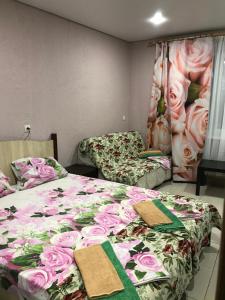 Кровать или кровати в номере Гостевой Дом «Роза» 
