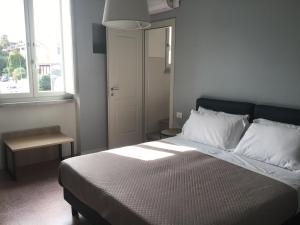 Posteľ alebo postele v izbe v ubytovaní VILLA ACTEA