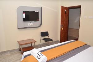 TV a/nebo společenská místnost v ubytování HOTEL PANCHAVARNAA