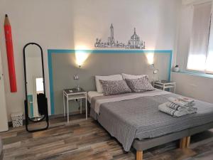 Ένα ή περισσότερα κρεβάτια σε δωμάτιο στο Casa Montanari B&B