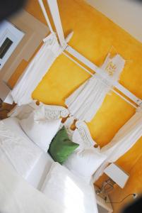 Rúm í herbergi á Hotel Hubertus