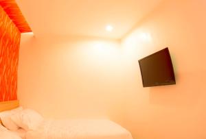 TV a/nebo společenská místnost v ubytování DeMira Hotel