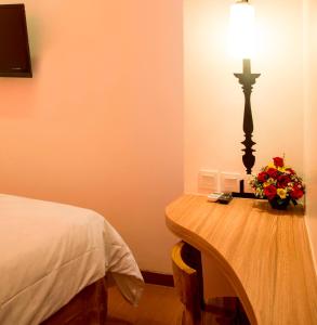 Cama o camas de una habitación en DeMira Hotel