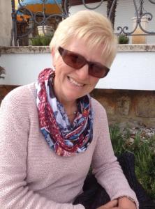 an older woman wearing sunglasses and a scarf at Haus Gisela in Endingen