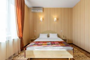 Postel nebo postele na pokoji v ubytování Гостиница Siesta Киев