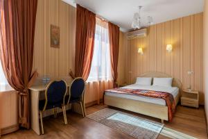 Postel nebo postele na pokoji v ubytování Гостиница Siesta Киев + 19 fotografií