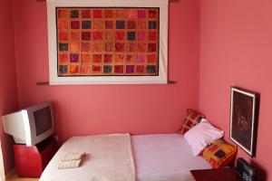 Letto o letti in una camera di Apartment Room with a view