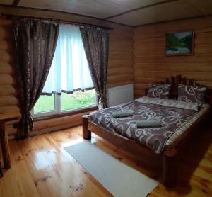 Postel nebo postele na pokoji v ubytování Sadyba Cherry