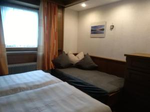 Postel nebo postele na pokoji v ubytování Zillertal Apartment mit Traumausblick - Haus Kirchler