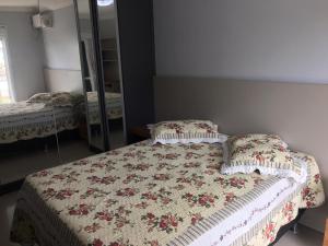 Postel nebo postele na pokoji v ubytování Apto. 03 Quartos à 500m da Praia