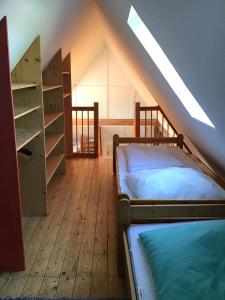 Postel nebo postele na pokoji v ubytování FeWo Spitzweg, Garlstorf - Lüneburger Heide