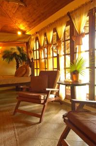 a living room with a couch and a table at The Palms Zanzibar in Bwejuu