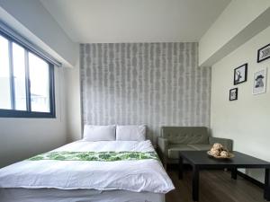 Llit o llits en una habitació de 梧桐樹