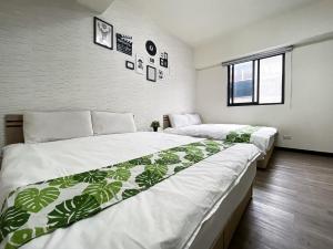 Llit o llits en una habitació de 梧桐樹